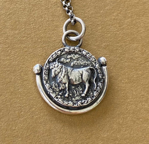 Taurus handmade sterling silver pendant. Zodiac sign coin necklace.