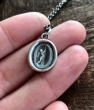 Load image into Gallery viewer, cupid pendant..... love enflamed, cupid lighting a torch. Antique wax letter seal. sterling falling in love pendant.