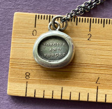 Load image into Gallery viewer, Forgive and forget……  antique wax letter seal impression.  Handmade amulet in sterling silver