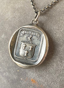 Courage, have to courage to succeed. Reap your rewards.  success. Lion and weath sheafs heraldry pendant. Antique wax seal impression.