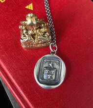 Load image into Gallery viewer, Courage, have to courage to succeed. Reap your rewards.  success. Lion and weath sheafs heraldry pendant. Antique wax seal impression.