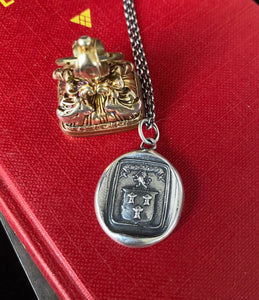 Courage, have to courage to succeed. Reap your rewards.  success. Lion and weath sheafs heraldry pendant. Antique wax seal impression.