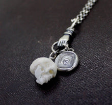 Load image into Gallery viewer, Hand Carved Skull Charm, Bone carved skull. memento mori skull, mourning jewelry, halloween jewelry.
