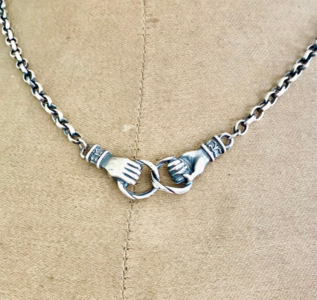 Clasped hands necklace.  Sterling silver, joined hands, 3mm sterling rolo chain in the length of your choosing