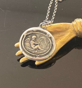 Love findeth the way…… Tassie seal with Cupid and rough seas. Sterling silver antique wax letter seal amulet. Handmade jewelry.
