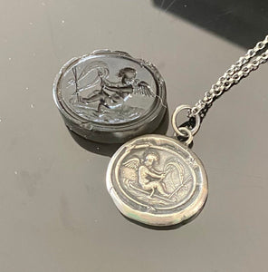 Love findeth the way…… Tassie seal with Cupid and rough seas. Sterling silver antique wax letter seal amulet. Handmade jewelry.