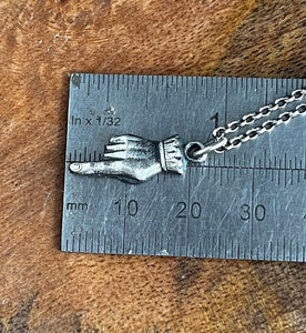 Adorable and quirky Victorian hand necklace in sterling silver.