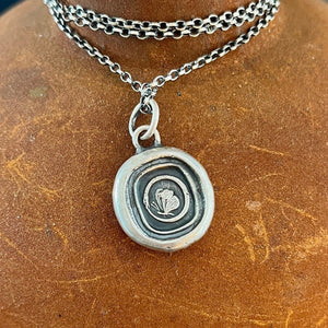 Cycle of life, rebirth, immortality, butterfly and ouroboros. Antique wax seal impression in sterling silver.