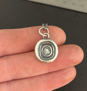 Cycle of life, rebirth, immortality, butterfly and ouroboros. Antique wax seal impression in sterling silver.