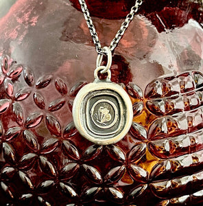 Cycle of life, rebirth, immortality, butterfly and ouroboros. Antique wax seal impression in sterling silver.