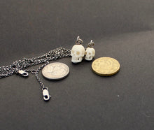 Load image into Gallery viewer, Hand Carved Skull Charm, Large and Small.  Bone carved skull. memento mori skull, mourning jewelry, halloween jewelry.