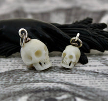 Load image into Gallery viewer, Hand Carved Skull Charm, Large and Small.  Bone carved skull. memento mori skull, mourning jewelry, halloween jewelry.